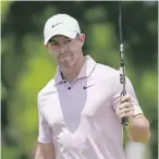  ?? GERALD HERBERT, THE ASSSOCIATE­D PRESS ?? Rory McIlroy salutes to the crowd after making a birdie putt on the second green during the first round of the Zurich Classic at TPC Louisiana in Avondale on Thursday.