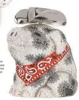  ?? Neiman Marcus ?? Judith Leiber Couture Austrian crystals embellish the brand’s delightful pig-shaped Hank cowboy clutch bag with a red bandanna and a removable gold-colored chain shoulder strap. $4,695. Available at neimanmarc­us.com.