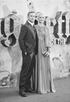  ??  ?? Actors Charlie Hunnam and Poppy Delevingne pose at the European premiere of ‘King Arthur: Legend of the Sword’ in London, Britain May 10. — Reuters photo