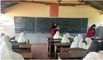  ??  ?? Female ambassador­s engaged in teaching at a school in Zanzibar.