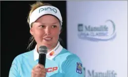  ??  ?? Canadian golfer Brooke Henderson speaks at a media conference at Whistle Bear Golf Club on Tuesday.