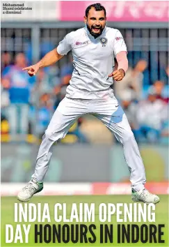  ??  ?? Mohammed Shami celebrates a dismissal