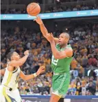  ?? KYLE TERADA/USA TODAY SPORTS ?? Celtics center/forward Al Horford passes against Warriors guard Jordan Poole in Game 1 of the NBA Finals on Thursday.