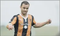  ??  ?? The Scotland internatio­nal is set to join his hometown club Aberdeen in a move from Hull City.