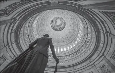  ?? J. SCOTT APPLEWHITE/AP ?? The Rotunda of the U.S. Capitol remains quiet as a partial government shutdown continues into its second week.