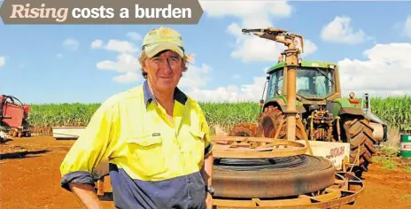  ?? PHOTO: MIKE KNOTT ?? SHOCKING PRICES: Bundaberg cane grower Richard Zunker is concerned about the escalating costs of electricit­y.