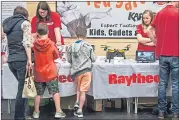  ??  ?? Raytheon’s stand at the Fife Science Festival event in Lomond Centre, Glenrothes