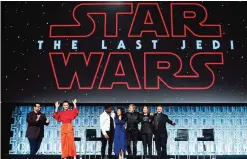  ??  ?? Josh Gad, Daisy Ridley, Kelly Marie Tran, Mark Hamill, Katheen Kennedy and Rian Johnson attend the Star Wars: The Last Jedi panel during the 2017 Star Wars Celebratio­n at Orange County Convention Center in Orlando, Florida. — AFP