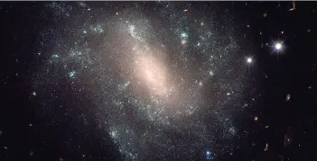  ?? CREDIT: NASA / ESA / L. FRATTARE ( STSCI) ?? Taken by Hubble Space Telescope, this image shows UGC 9391, a galaxy containing stars that help astromers determine how quickly the universe is expanding.