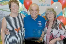  ??  ?? Baw Baw Shire citizen of the year Les Matkovich is congratula­ted by his daughter Heidi and Lynn Wells (right).