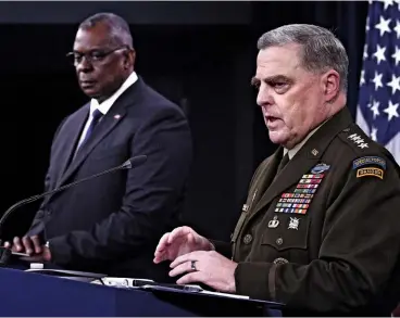  ??  ?? LIKE-MINDED Both Defense Secretary Lloyd Austin (left) and Joint Chiefs Chairman Mark Milley support an overthe-horizon approach to fight terrorism.