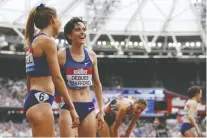  ?? IAN KINGTON/AFP/GETTY IMAGES ?? Among the few Canadian women with an outside shot at the podium in track and field is 1,500m runner Gabriela Debues-stafford, second from left, who is ranked 11th in the world.