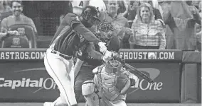  ?? SUE OGROCKI/AP ?? Astros outfielder Yordan Alvarez hits a three-run home run against the Phillies during Game 6 of the World Series on Nov. 5.