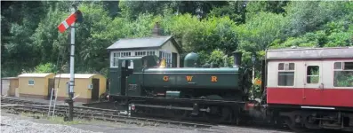  ?? JIMMY JAMES ?? GWR ‘8750’ 0-6-0PT No. 4612 prepares to leave Bodmin General on July 25, following firebox repairs. The ballast in the foreground shows where dipped rail joints on the shed road are being repaired and drainage work undertaken, in preparatio­n for the planned second platform (SR479).