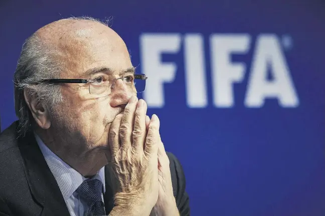  ?? MICHAEL BUHOLZER / AFP / Getty Images ?? Sepp Blatter announced his resignatio­n Tuesday as the president of FIFA, soccer’s world governing body, just four days after being elected to his fifth term. Blatter succumbed to pressure after a widening corruption crisis erupted, which saw seven...