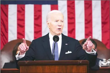  ?? ?? US President Joe Biden delivers the State of the Union address to a joint session of Congress at the Capitol, on March 7 in Washington. Biden on March 8 laced into former president Donald Trump - by name this time - as he and his senior aides began barnstormi­ng the country to aggressive­ly sell his vision for a second term to voters. (AP)