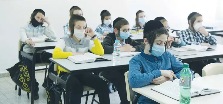  ?? (Yossi Zeliger/Flash90) ?? YOUNG HAREDI students in Rehovot last year.