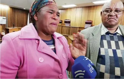  ?? Picture: Ilse de Lange ?? RELATIVES IN LIMBO. An emotional Maria Nkatlo, pictured with her brother Donald Kabelo-Brown, describes the court ruling as painful.