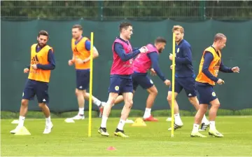  ??  ?? Scotland players during training. — Reuters photo