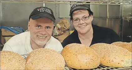  ?? TELEGRAM FILE PHOTO ?? Haukur Leifs Hauksson and his wife, Adalbjork Sigurthors­dottir, at their Volcano Bakery in St. John’s last year. Hauksson died suddenly May 21.