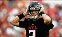  ?? MARK LOMOGLIO/ASSOCIATED PRESS 2021 ?? During a 48-25 loss to the Buccaneers on Sept. 19, Falcons quarterbac­k Matt Ryan threw three intercepti­ons, including two pick-sixes in the fourth quarter.