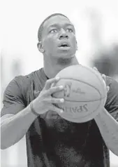  ?? DAVID SANTIAGO/AP ?? Heat guard Kendrick Nunn eyes the basket before attempting a shot Wednesday during practice.