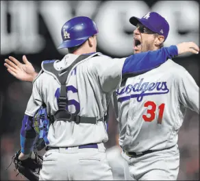  ?? Jed Jacobsohn The Associated Press ?? The ability to acquire stars like Max Scherzer, right, is a reason sportsbook­s like the Dodgers’ chances to win the 2022 World Series.