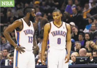  ?? Sue Ogrocki / Associated Press 2012 ?? Plenty has changed since James Harden (left) and Russell Westbrook played together in Oklahoma City, including the guards’ style of play. They now play for the Rockets.