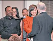  ?? GENEVIEVE BOOKWALTER/PIONEER PRESS ?? Robin Rue Simmons shakes hands with Mayor Steve Hagerty after taking the oath of office in 2017.