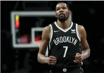  ?? ADAM HUNGER — THE ASSOCIATED PRESS ?? Brooklyn Nets forward Kevin Durant (7) is unlikely to play on Christmas Day against the Los Angeles Lakers due to health and safety protocols.