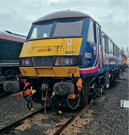  ?? ?? Still displaying its ‘Barbie’ livery, No. 90021 is pictured on February 22 following its return to Toton. BC Collection