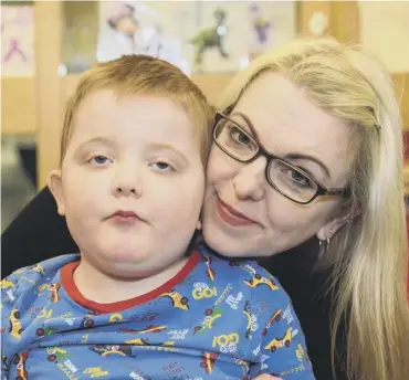  ?? PICTURE; IAN GEORGESON ?? 0 Karen Gray with her son Murray who has been prescribed medicinal cannabis