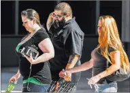  ?? Patrick Connolly ?? Las Vegas Review-journal @Pconnpie Supporters of arrested Vagos Outlaw Motorcycle Gang members walk out of the Lloyd George U.S. Courthouse.