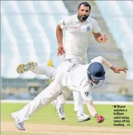  ?? PTI ?? M Shami watches a brilliant catch being taken off his bowling.