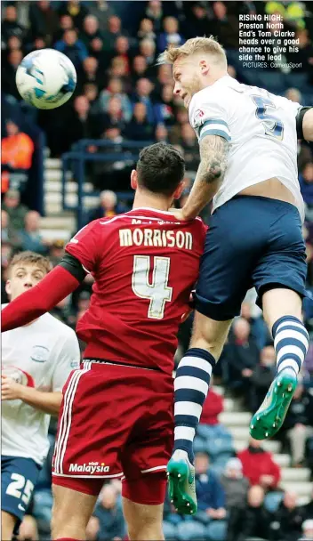  ?? PICTURES: CameraSpor­t ?? RISING HIGH: Preston North End’s Tom Clarke heads over a good chance to give his side the lead