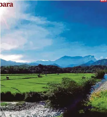  ??  ?? Panorama indah berlatarka­n Gunung Kinabalu.