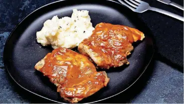  ?? [PHOTO BY DEB LINDSEY/FOOD STYLING BY AMANDA SOTO, FOR THE WASHINGTON POST] ?? Chicken Thighs With Classic American Barbecue Sauce