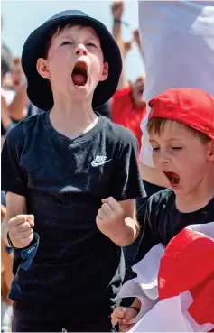  ??  ?? Life’s a beach! Children celebrate England’s win