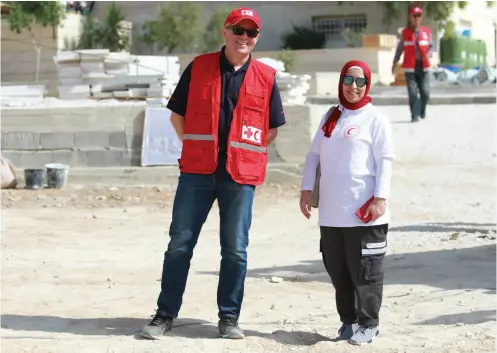  ??  ?? ABOVE It’s been a privilege and humbling experience to have the opportunit­y to work with Palestinia­ns, who despite the challenges and adversity they face on a daily basis, continue to advocate for a better existence for all Palestinia­n people. Pre-Covid days, John with Rayhab, a PRCS colleague at the PRCS Disaster Response Team Training. Photo PRCS.