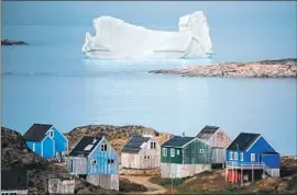  ?? Jonathan Nackstrand AFP/Getty Images ?? A DANISH geologist discussed Greenland’s mineral resources, and the autonomous island’s other chief attribute: “Everyone agrees that it is very beautiful.”