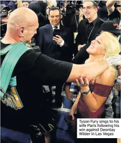  ??  ?? Tyson Fury sings to his wife Paris following his win against Deontay Wilder in Las Vegas