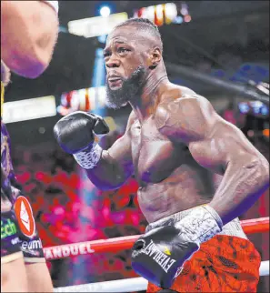  ?? Chase Stevens
The Associated Press ?? Deontay Wilder, pictured fighting Tyson Fury in 2021, returned to beat Robert Helenius on Saturday night in the first round in New York.