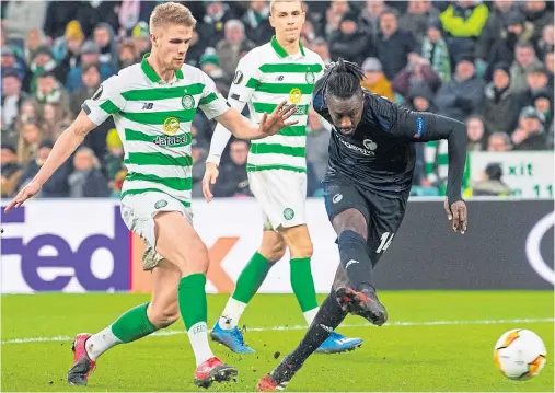  ??  ?? THREE AND EASY: Copenhagen’s Dame N’Doye scores to make it 3-1 during the Europa League last-32 second leg against Celtic last night