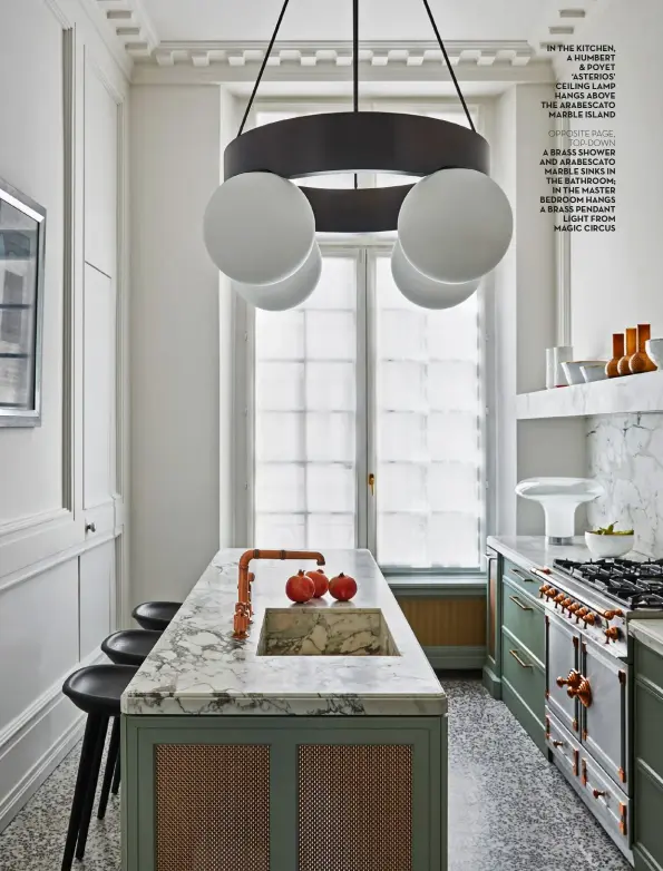  ??  ?? in the kitchen, a humbert & poyet ‘asterios’ ceiling lamp hangs above the arabescato marble island
OPPOSITE PAGE, TOP-DOWN a brass shower and arabescato marble sinks in the bathroom; in the master bedroom hangs a brass pendant light from magic circus