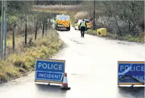  ??  ?? Cordoned off A lane near Cathkin Braes where the burned out car was discovered on Monday night