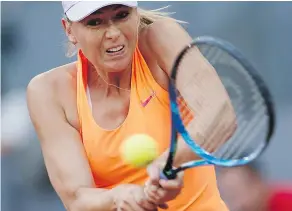  ?? FRANCISCO SECO/AP/FILES ?? Maria Sharapova says that a muscle tear will not allow her to compete at grass-court tournament­s for now.