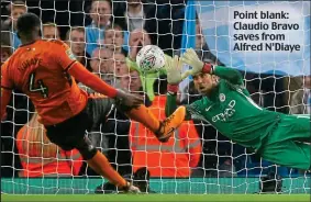  ??  ?? Point blank: Claudio Bravo saves from Alfred N’Diaye