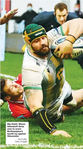  ?? PICTURE: Getty Images ?? Big finish: Shaun Adendorff dives over to score Northampto­n’s fourth try against Gloucester