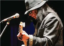  ?? Evan Agostini/Associated Press ?? Singer-songwriter Sixto Rodriguez, whose work flopped in the U.S. but drew an audience in South Africa, has died at the age of 81.