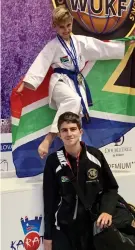  ??  ?? Galliano Boni and his brother Aligi on the podium after achieving a silver medal in Slovakia.